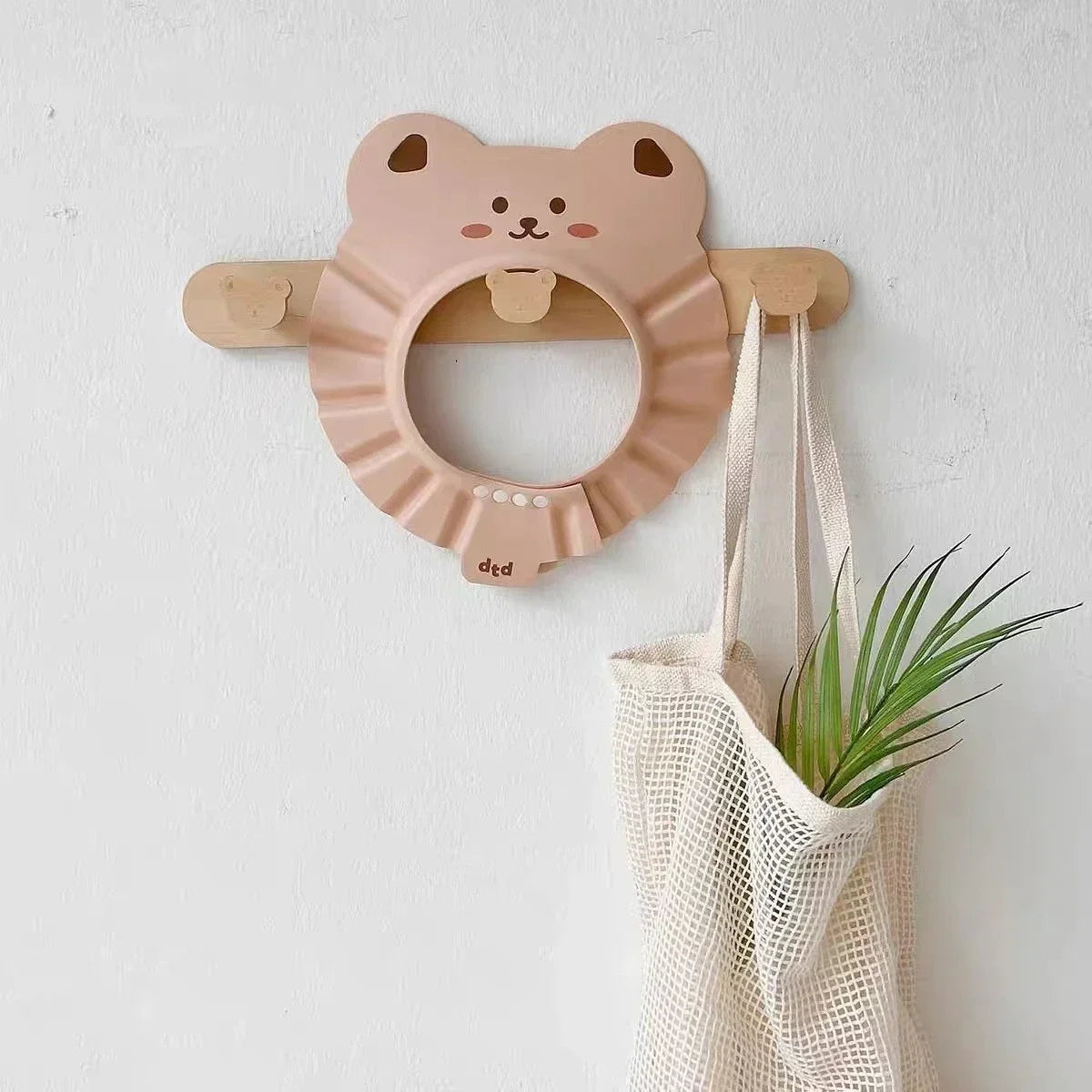 Bonnet de bain “Petits Animaux” – Protection réglable et anti-éclaboussures pour bébé
